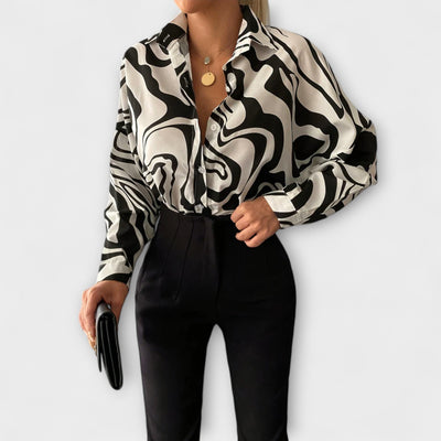Lara – Blusa larga con estampado abstracto