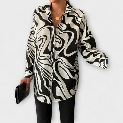 Lara – Blusa larga con estampado abstracto