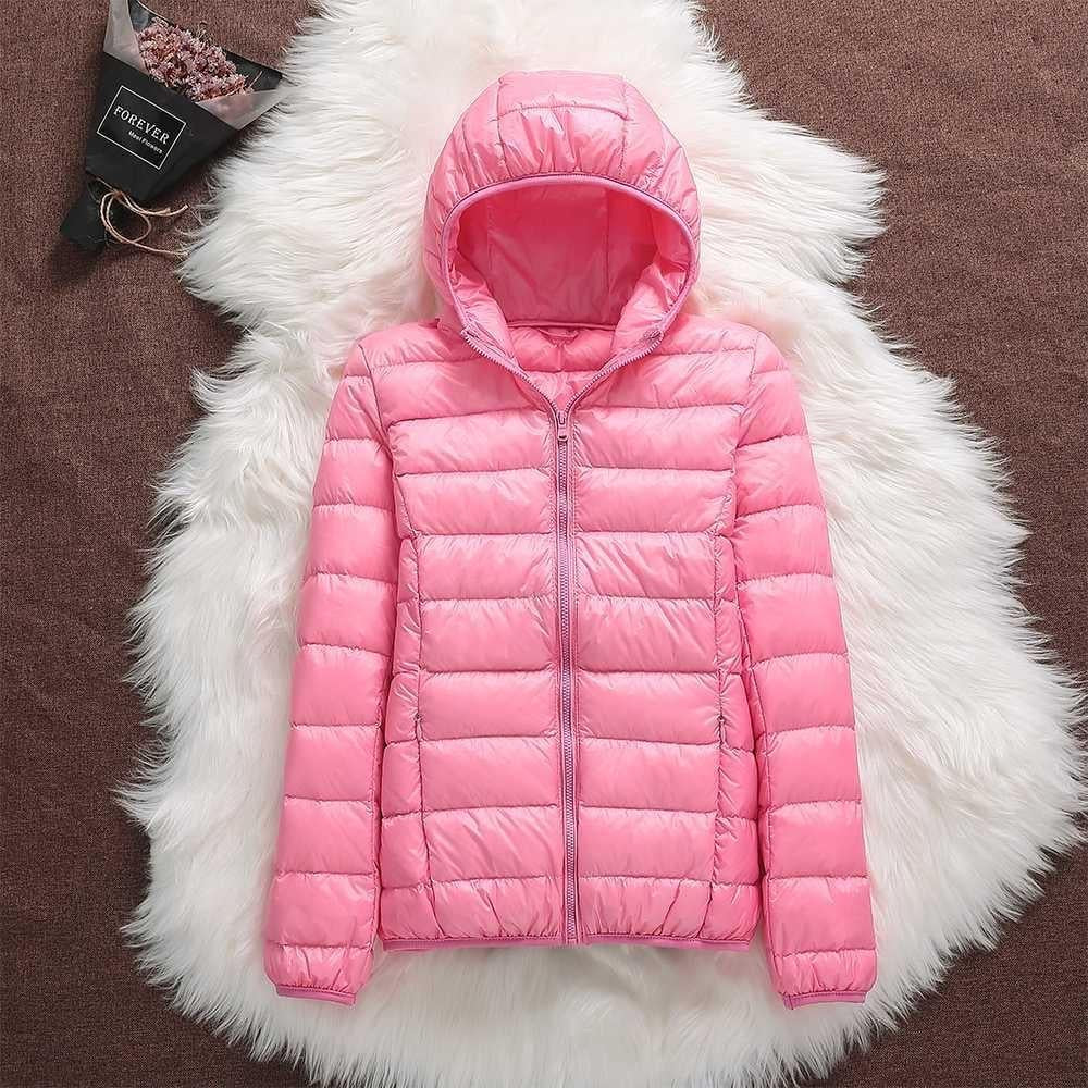Nord - Chaqueta impermeable con plumón blanco de pato y diseño plegable