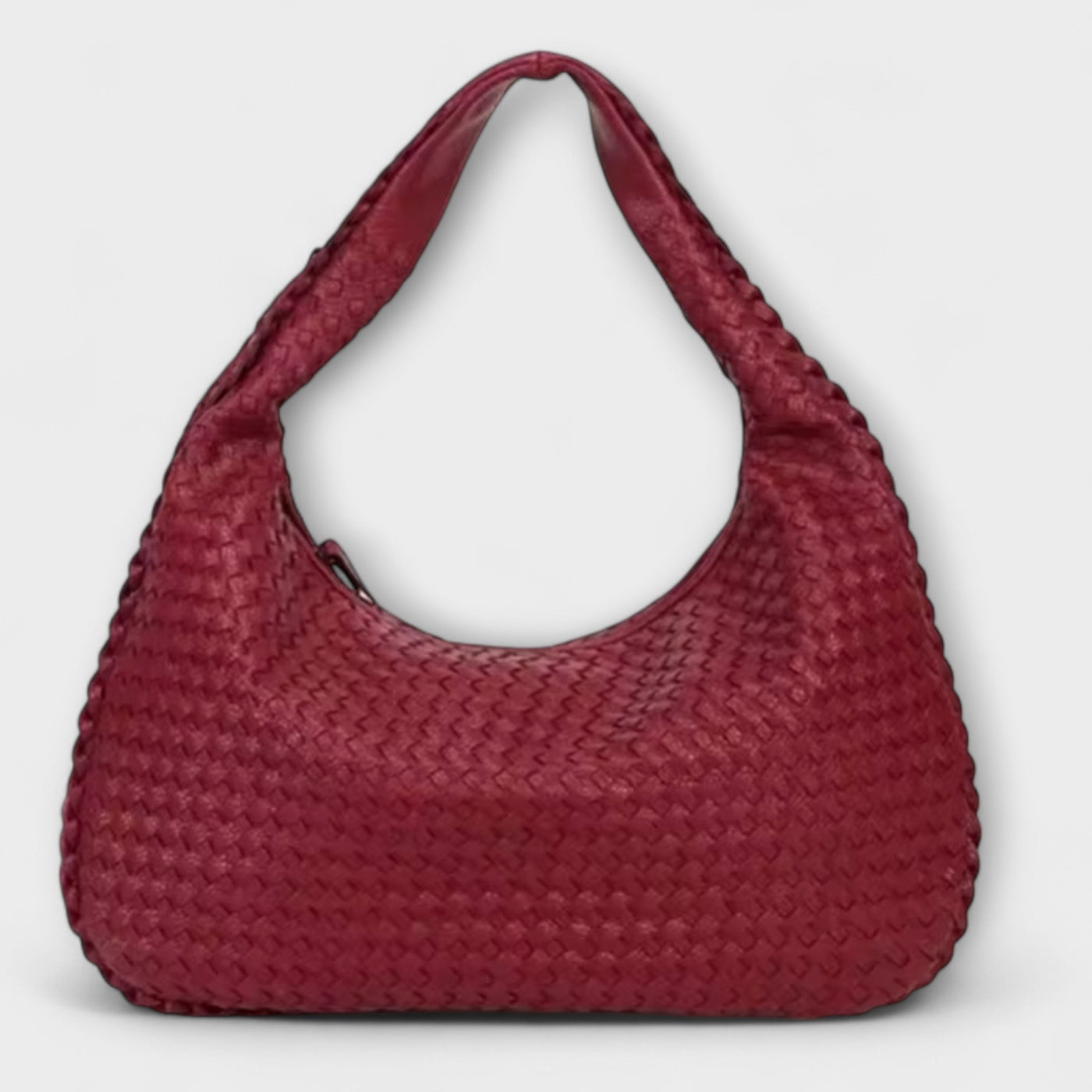 Cristina – Bolso de mano trenzado y moderno