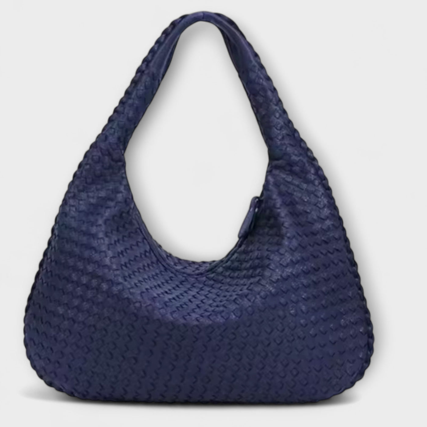 Cristina – Bolso de mano trenzado y moderno