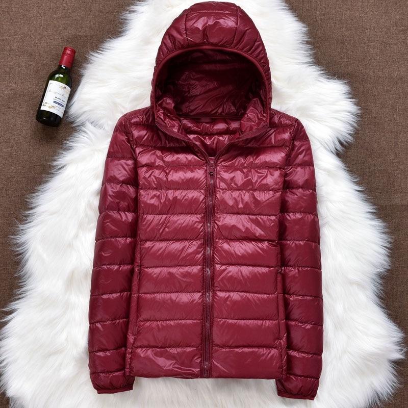 Nord - Chaqueta impermeable con plumón blanco de pato y diseño plegable