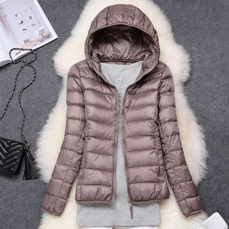 Nord - Chaqueta impermeable con plumón blanco de pato y diseño plegable