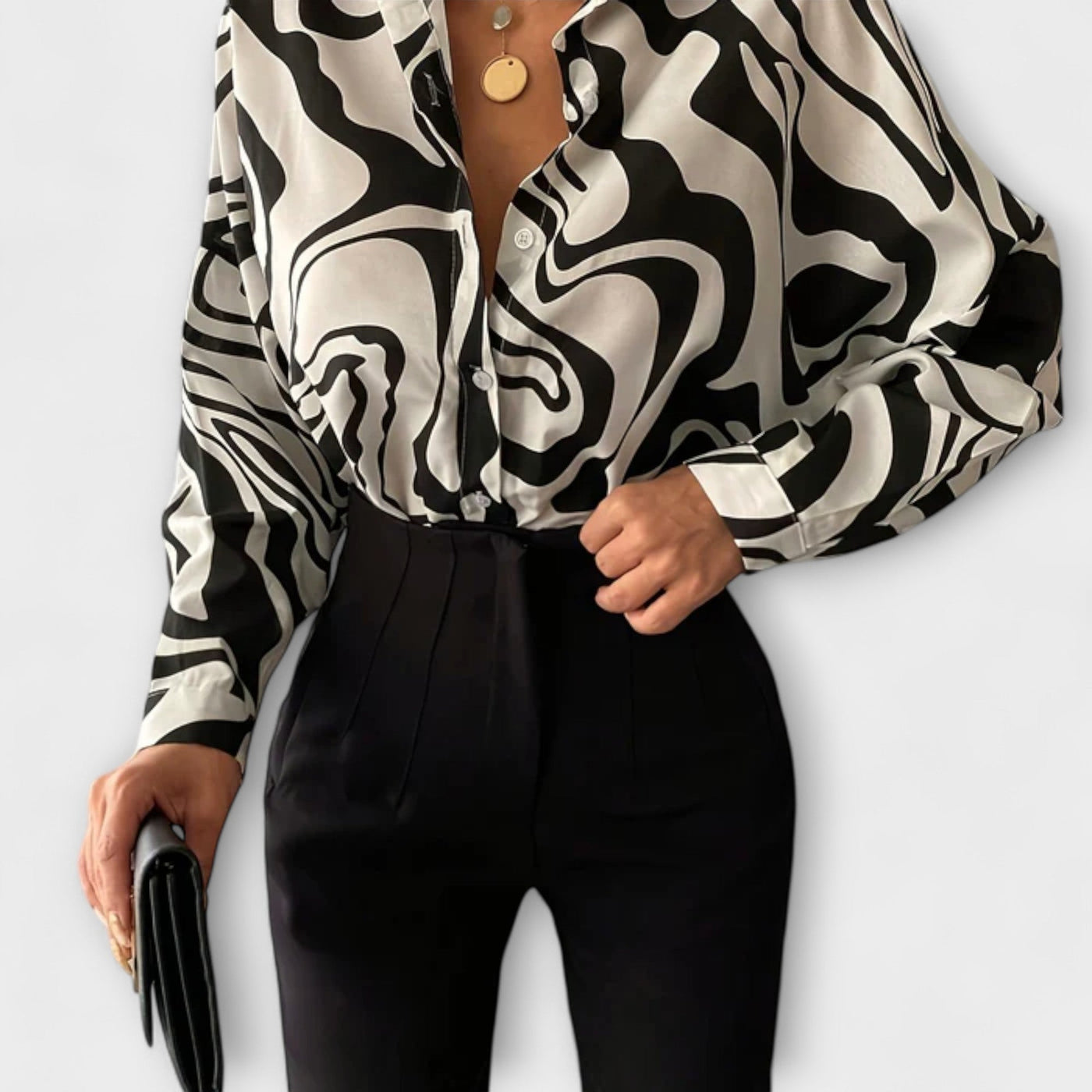 Lara – Blusa larga con estampado abstracto