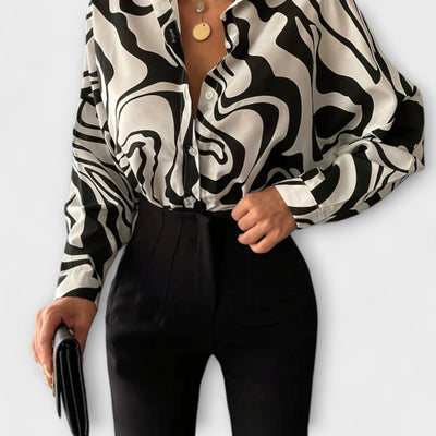 Lara – Blusa larga con estampado abstracto