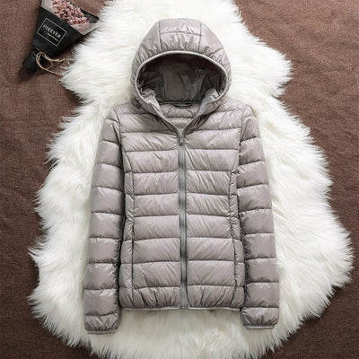 Nord - Chaqueta impermeable con plumón blanco de pato y diseño plegable