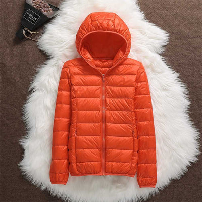 Nord - Chaqueta impermeable con plumón blanco de pato y diseño plegable
