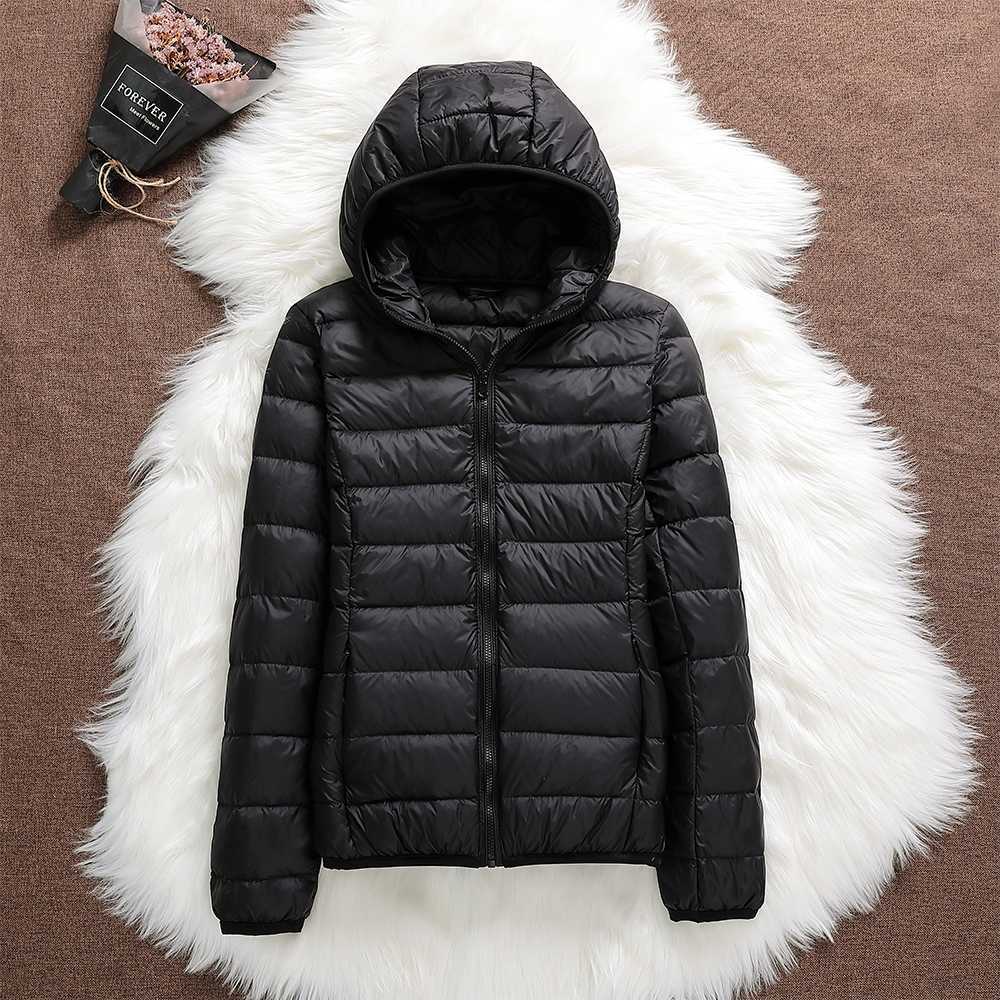 Nord - Chaqueta impermeable con plumón blanco de pato y diseño plegable