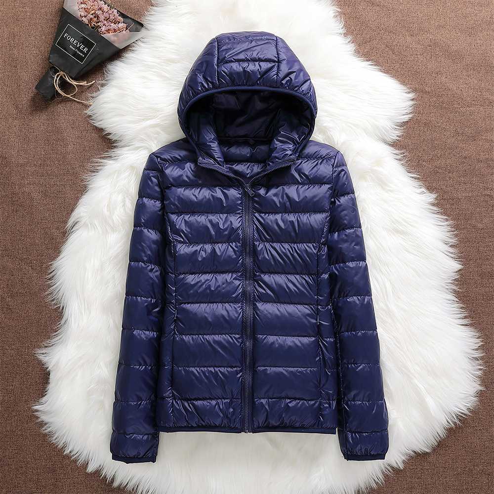 Nord - Chaqueta impermeable con plumón blanco de pato y diseño plegable