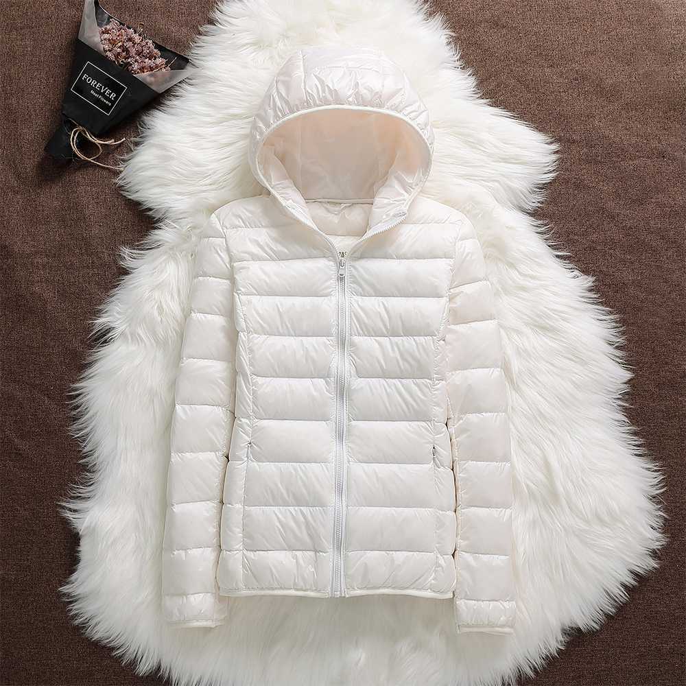 Nord - Chaqueta impermeable con plumón blanco de pato y diseño plegable