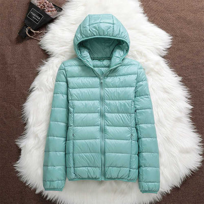 Nord - Chaqueta impermeable con plumón blanco de pato y diseño plegable